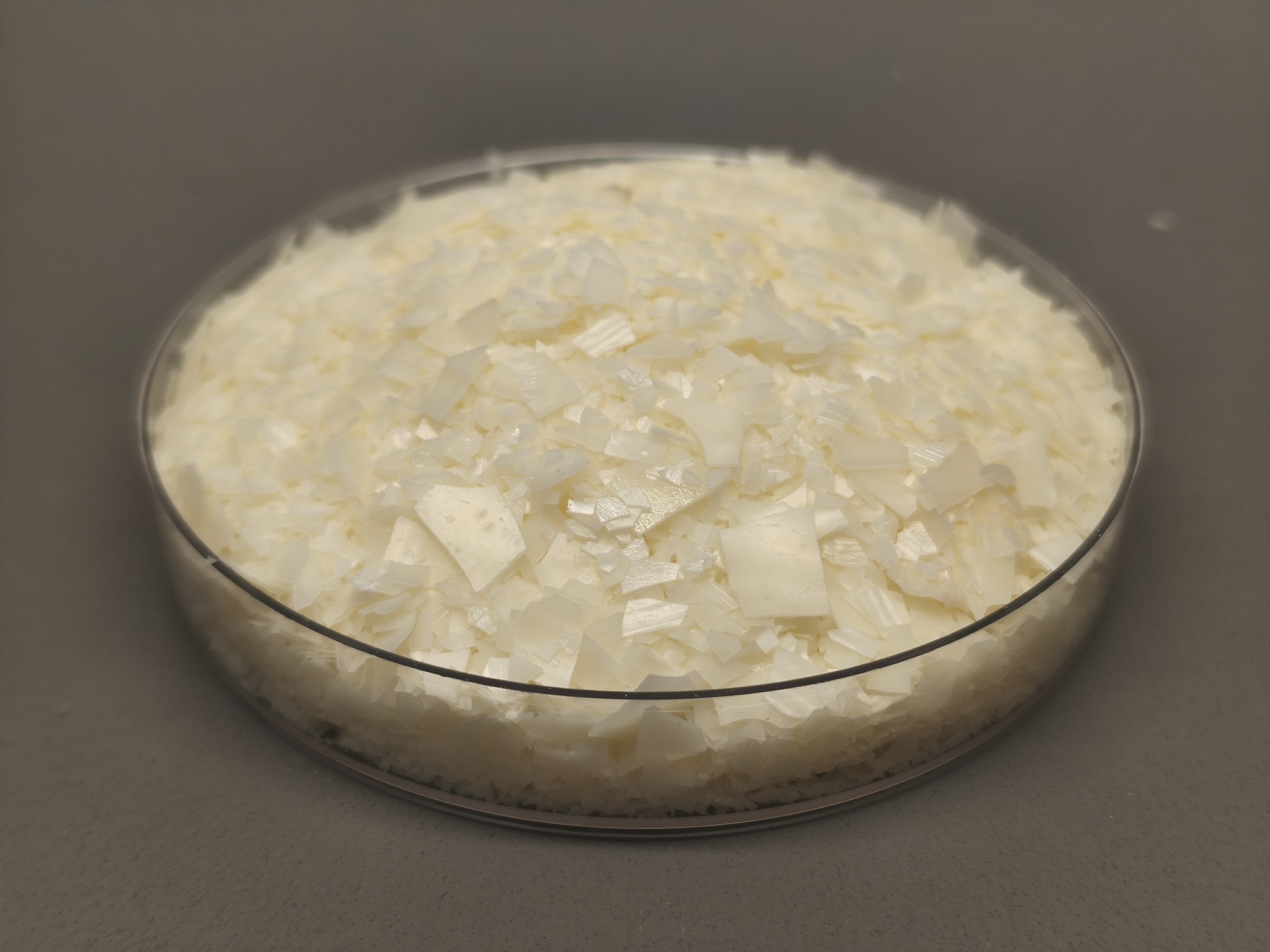 Cationic Softner Flake JF-2 for denim & kntted washing finishing.